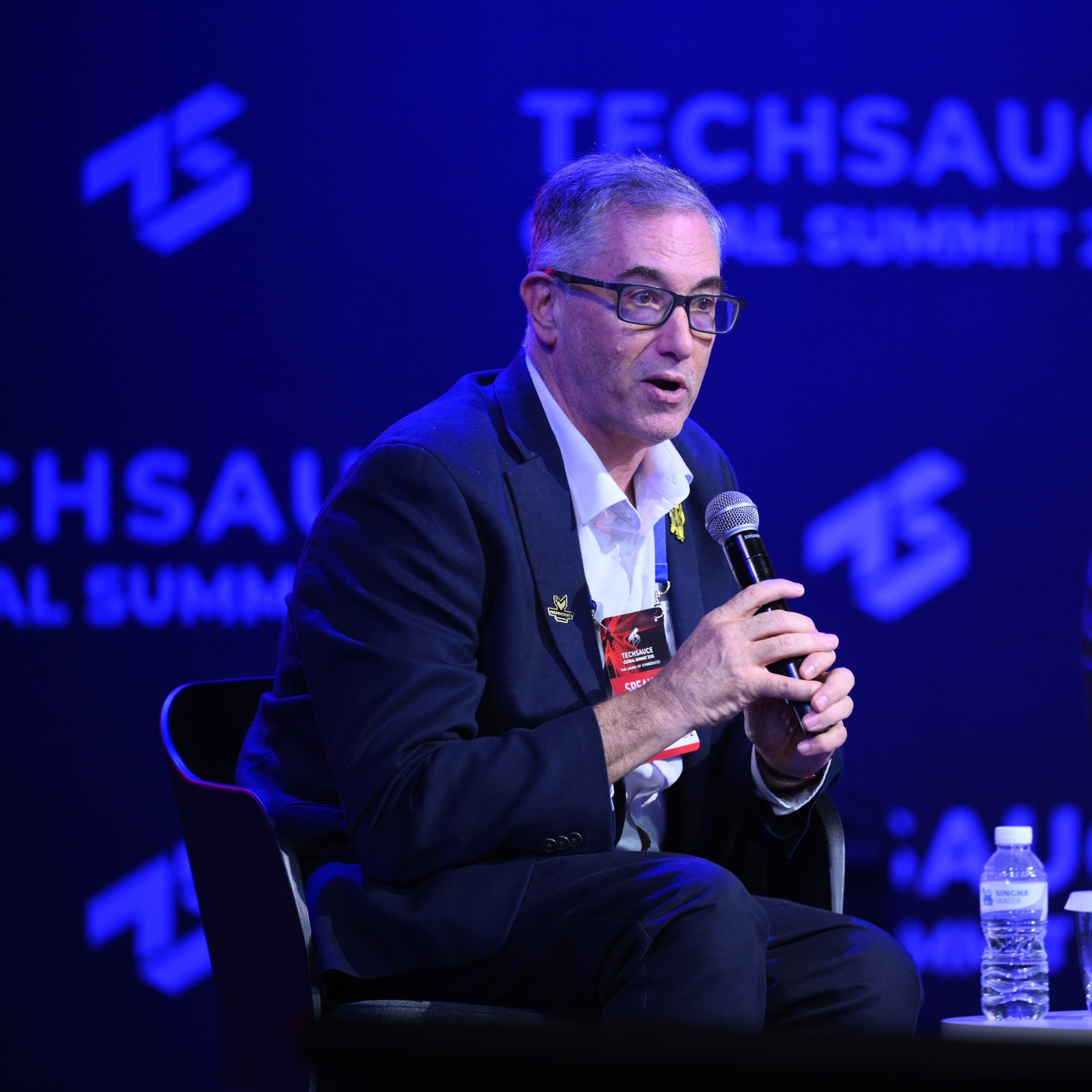 Marc Kramer speaking on stage at Techsauce Global Summit